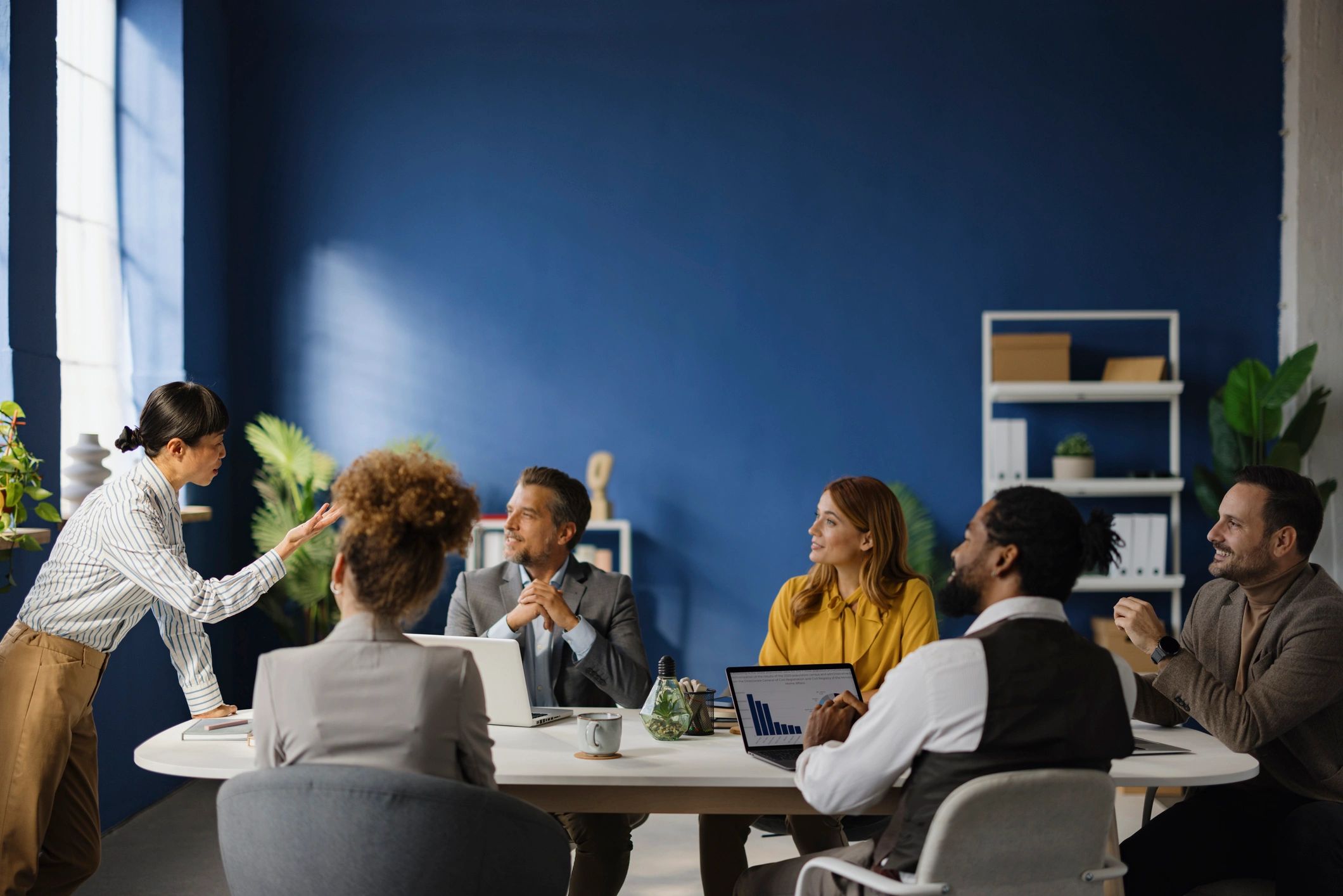 Executive leading a team meeting