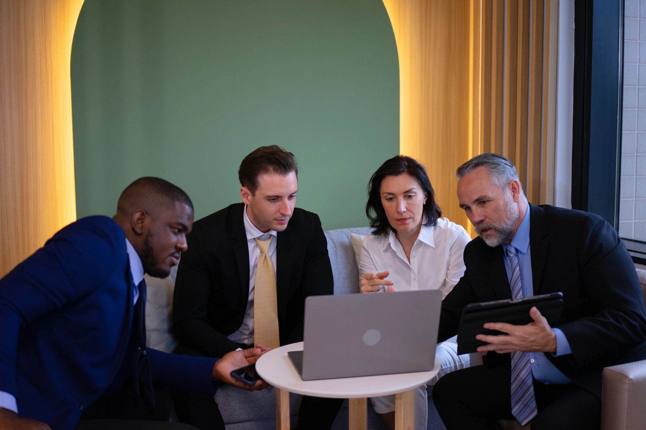 Group of white collar workers are working and meeting at office.